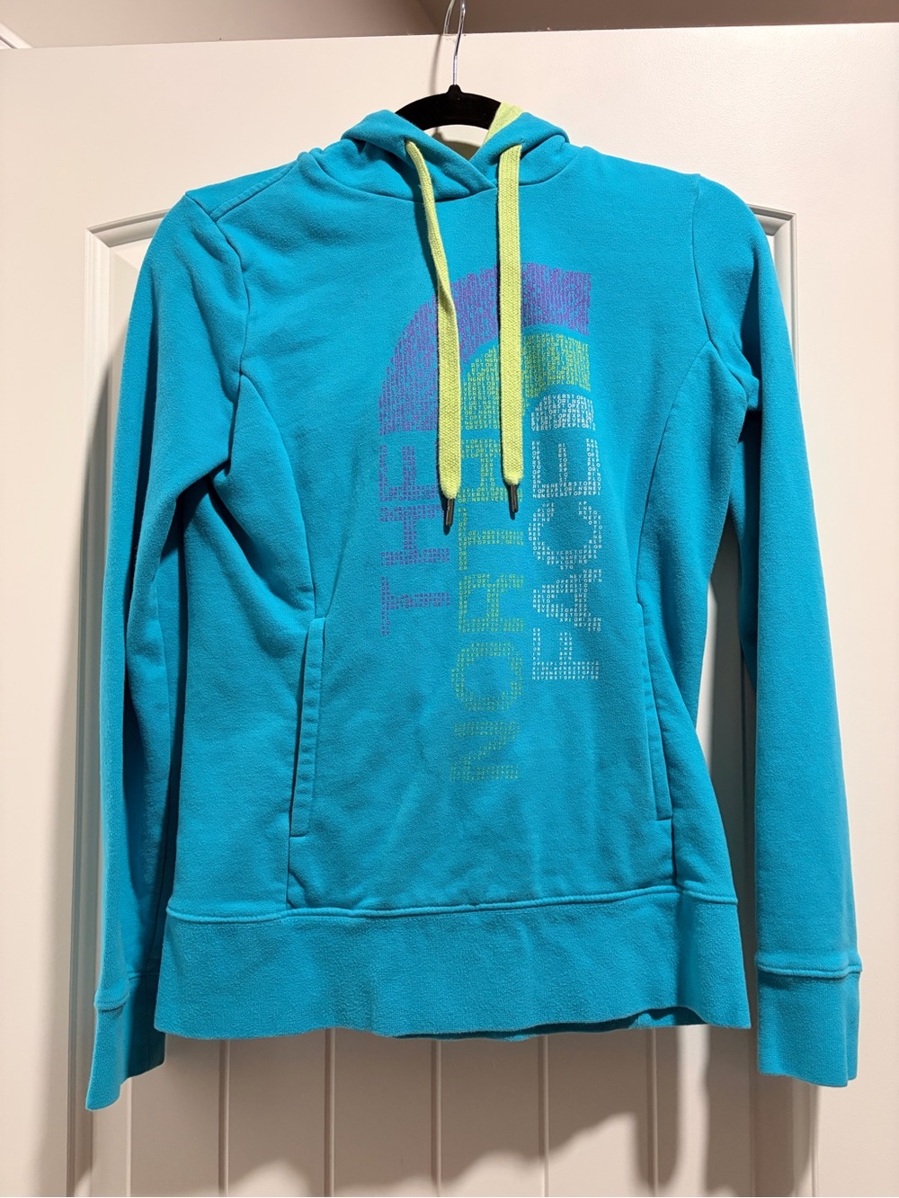 The North Face Women’s Teal Hooded Fleece with Yellow Drawcords